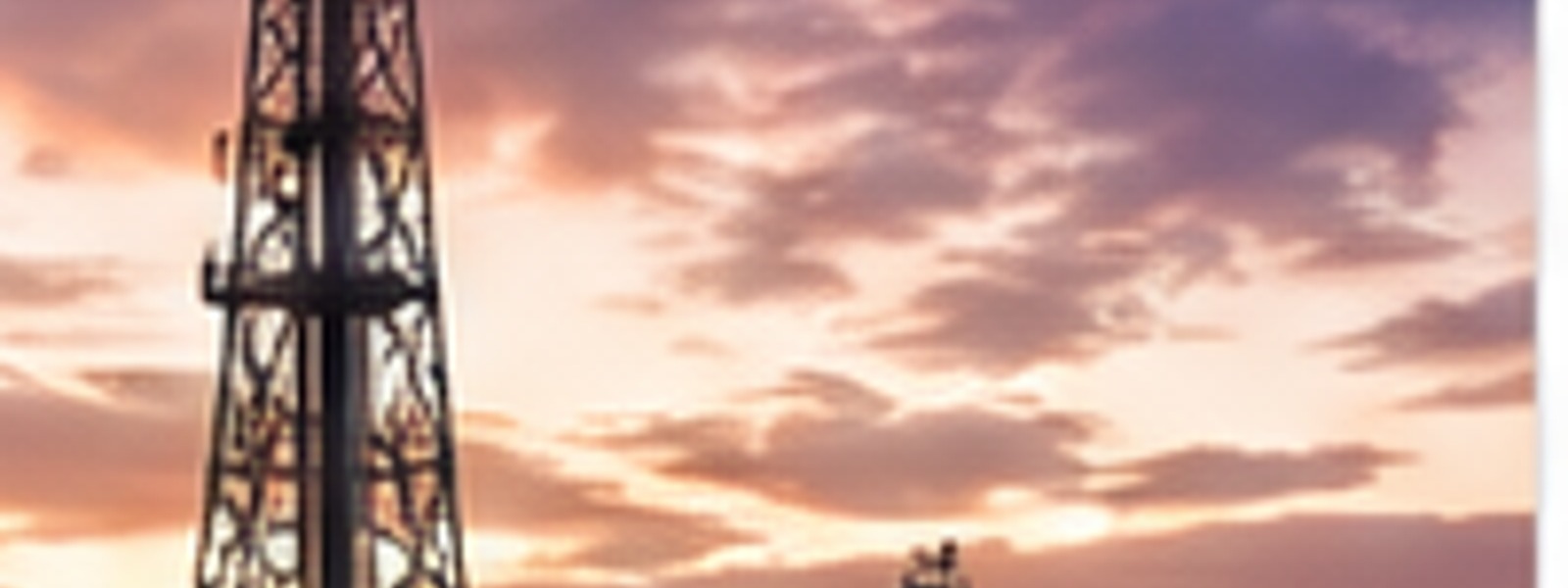 Drilling rig at sunset
